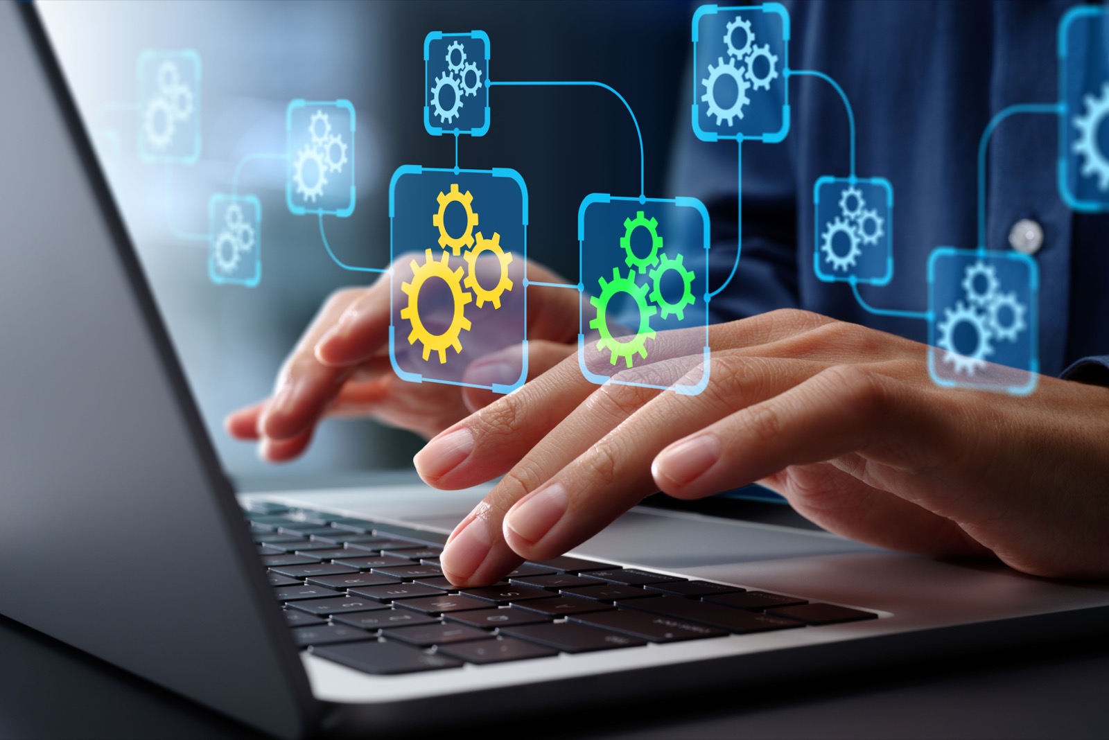 API automation and data transfer through system integration. Business Process Automation BPA technologies. Engineer using laptop computer to manage automation tools.